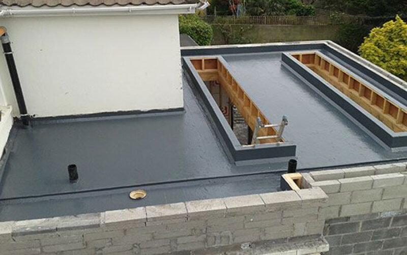 flat roof repairs & installs cork e&j roofing